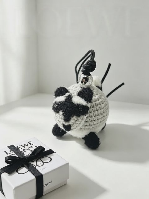 Counterfeit Loewe Raccoon Charm detail view visual reference