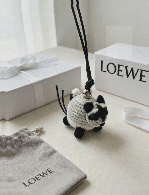 Counterfeit Loewe Raccoon Charm detail view visual reference