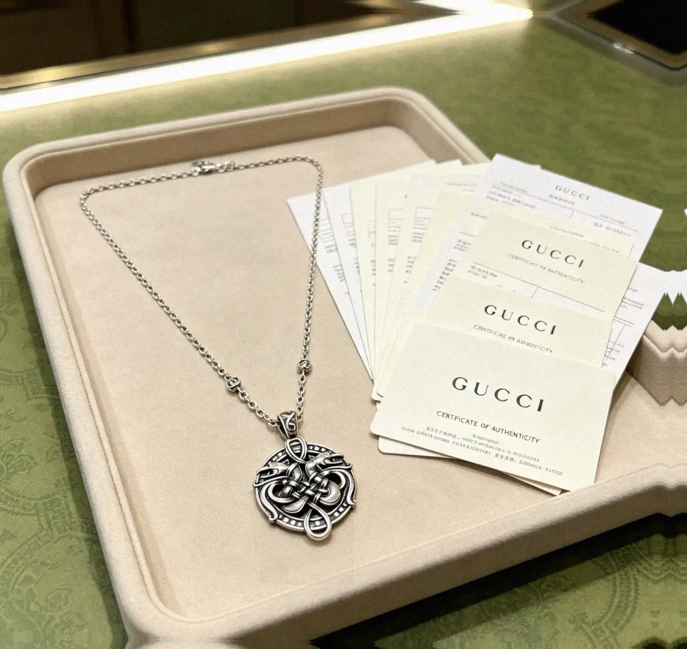 Counterfeit Gucci jewelry front view visual reference