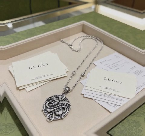 Counterfeit Gucci jewelry detail view visual reference