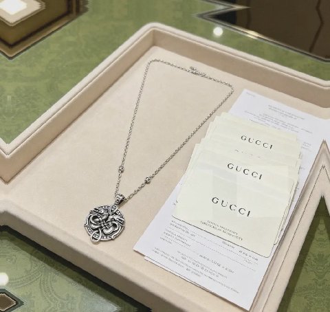 Counterfeit Gucci jewelry detail view visual reference
