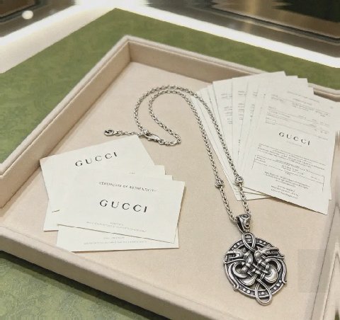 Counterfeit Gucci jewelry detail view visual reference