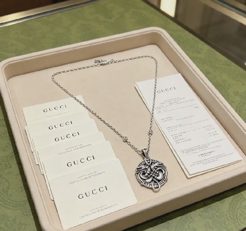 Counterfeit Gucci jewelry detail view visual reference