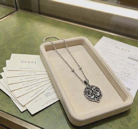Counterfeit Gucci jewelry detail view visual reference