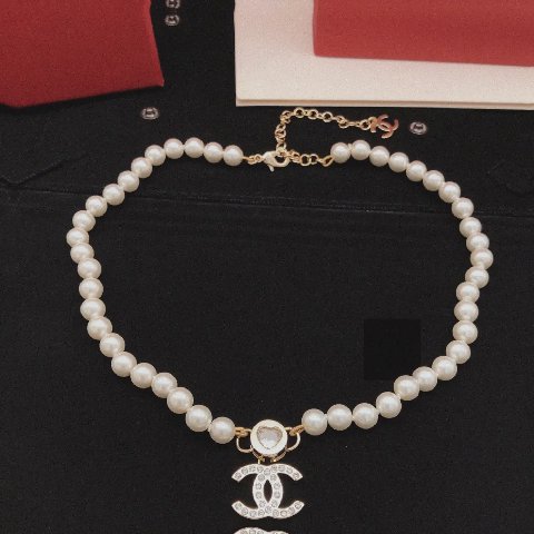 Counterfeit CHANEL jewelry front view visual reference