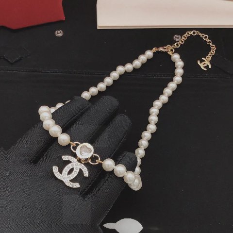 Counterfeit CHANEL jewelry back view visual reference