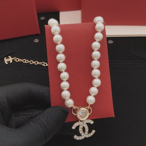 Counterfeit CHANEL jewelry detail view visual reference