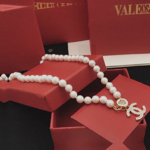 Counterfeit CHANEL jewelry detail view visual reference