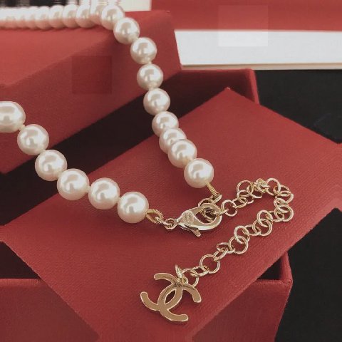 Counterfeit CHANEL jewelry detail view visual reference