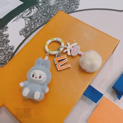 Counterfeit Louis Vuitton accessories back view visual reference