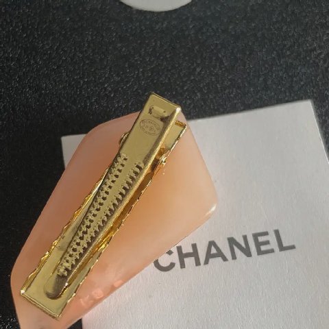 Counterfeit CHANEL accessories detail view visual reference