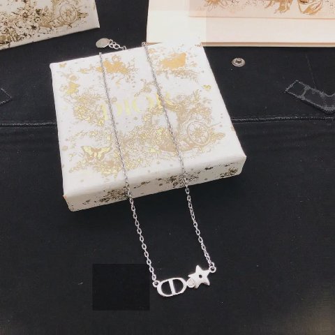 Counterfeit Dior jewelry detail view visual reference
