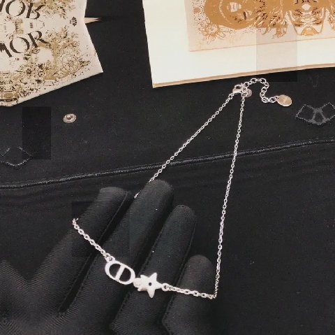 Counterfeit Dior jewelry detail view visual reference