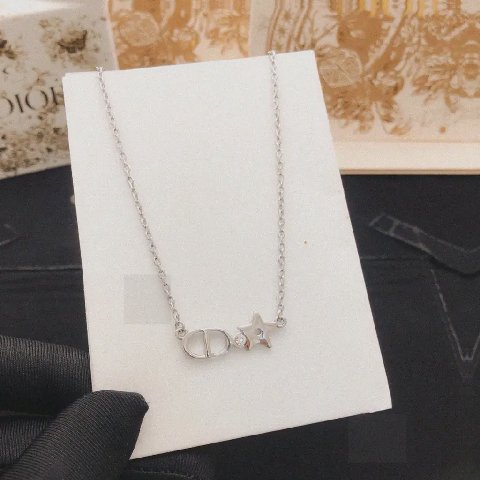 Counterfeit Dior jewelry detail view visual reference