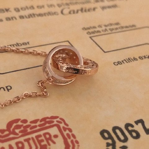 Counterfeit Cartier Love Double Circle Diamond Necklace detail view visual reference