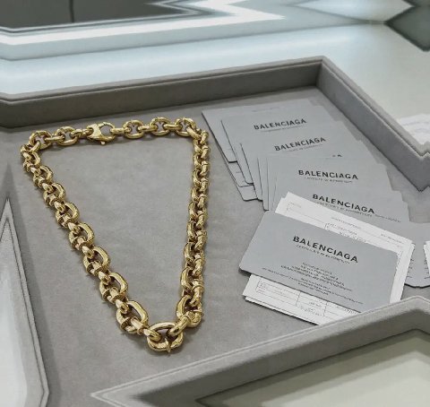 Counterfeit Balenciaga jewelry detail view visual reference