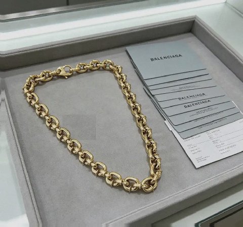 Counterfeit Balenciaga jewelry detail view visual reference