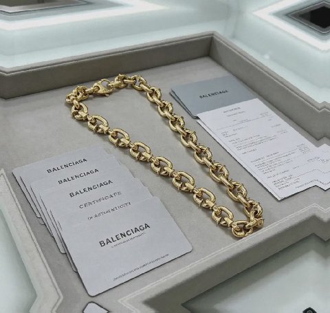 Counterfeit Balenciaga jewelry detail view visual reference