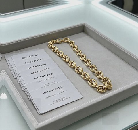 Counterfeit Balenciaga jewelry detail view visual reference