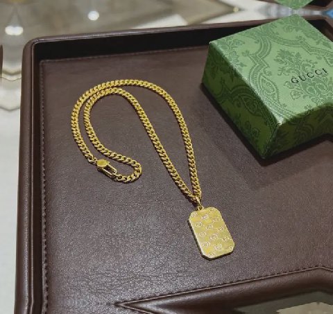 Counterfeit Gucci jewelry detail view visual reference