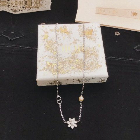 Counterfeit Dior jewelry detail view visual reference