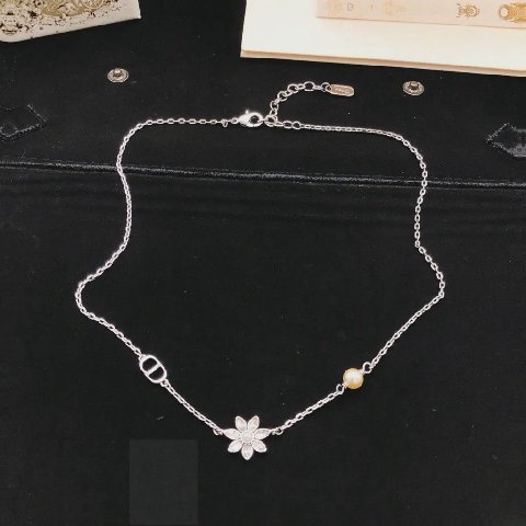Counterfeit Dior jewelry back view visual reference