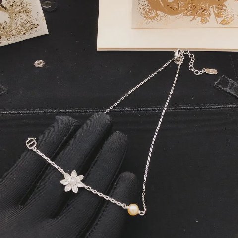 Counterfeit Dior jewelry detail view visual reference