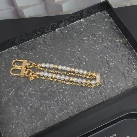 Counterfeit Louis Vuitton accessories detail view visual reference
