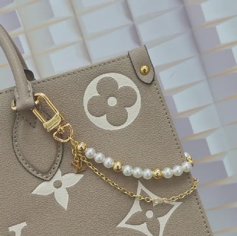 Counterfeit Louis Vuitton accessories back view visual reference