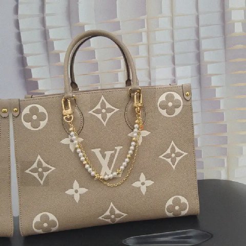 Counterfeit Louis Vuitton accessories detail view visual reference