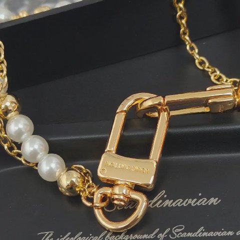Counterfeit Louis Vuitton accessories detail view visual reference