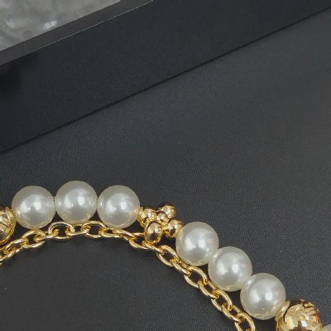 Counterfeit Louis Vuitton accessories detail view visual reference
