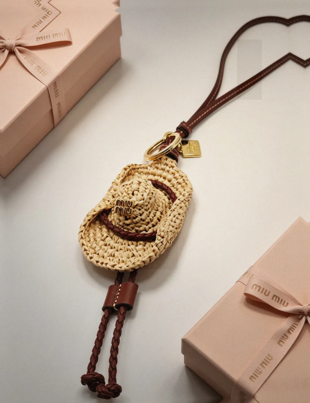 Counterfeit Miu Miu accessories front view visual reference