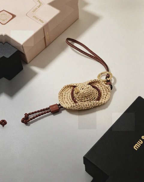 Counterfeit Miu Miu accessories detail view visual reference