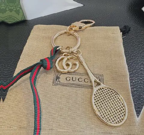 Counterfeit Gucci accessories detail view visual reference